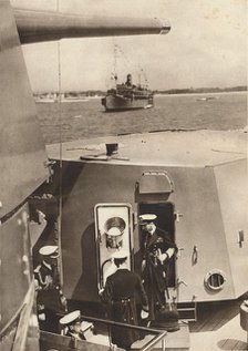 'King George VI in the gun turret of H.M.S Southampton', 1937. Artist: Unknown.