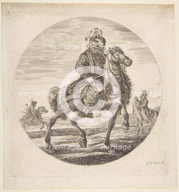 Hungarian horseman riding towards the right, other horsemen in the background, a circu..., ca. 1651. Creator: Stefano della Bella.