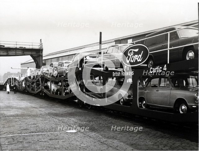 Train carrying cars of the Ford trademark, 1950.