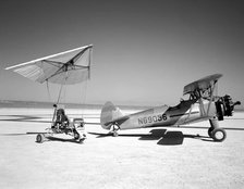Paresev 1-A on lakebed with tow plane, USA, 1962.  Creator: NASA.