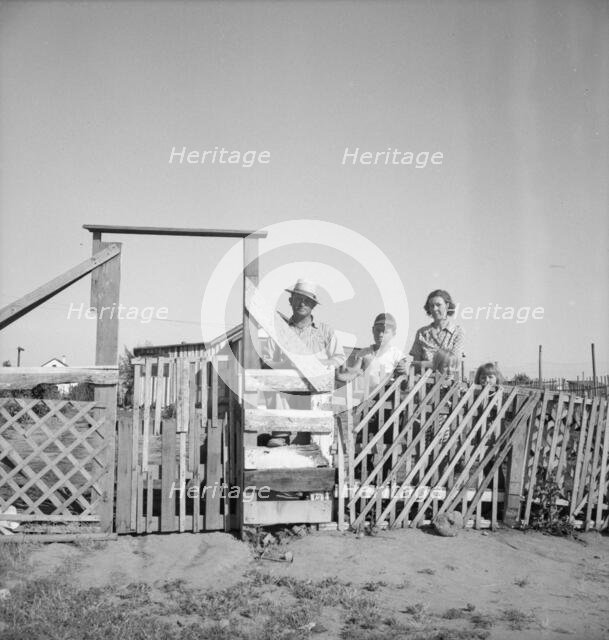 Family from Oklahoma, Highway City, near Fresno, California, 1939. Creator: Dorothea Lange.