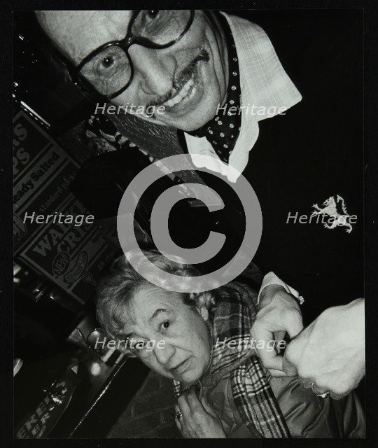 Tom and Marian Burnham at The Bell, Codicote, Hertfordshire, December 1986. Artist: Denis Williams