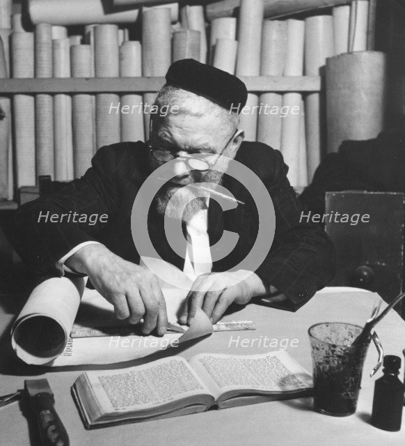 Working on a parchment scroll for a Torah, 1974. Artist: Unknown