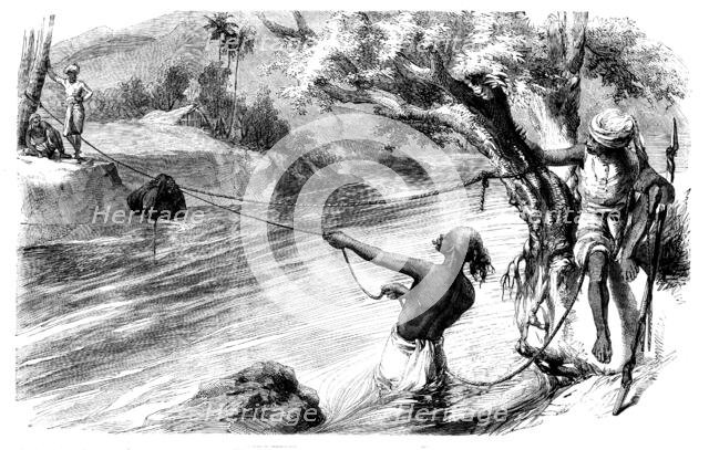 Sketches in India - Slinging Letter-bags across a Nullah in the Rainy Season, 1858. Creator: Unknown.