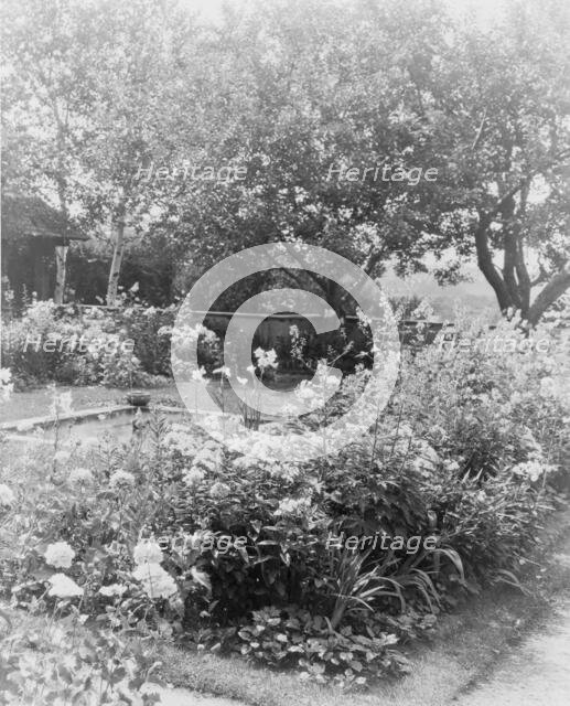 Flower garden, at the home of Mrs. Francis B. Harrington, Ipswich, Massachusetts, c1920 - 1940. Creator: Frances Benjamin Johnston.