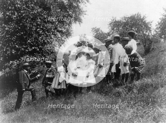 Field-trip - school children outdoors listening to man, DC Public School, 8th Division (?), (1899?). Creator: Frances Benjamin Johnston.