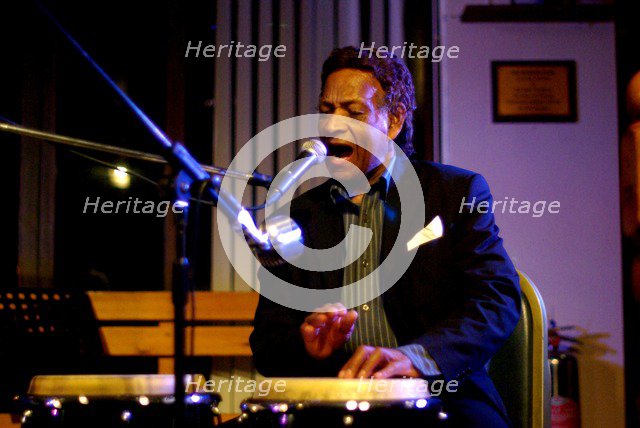 Frank Holder, Guyanan jazz singer and percussionist, Jazz Hastings, Hastings, East Sussex.  Artist: Brian O'Connor