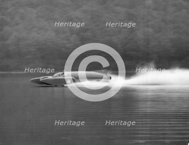 Donald Campbell in Bluebird K7, Coniston Water, Cumbria, 1958. Artist: Unknown
