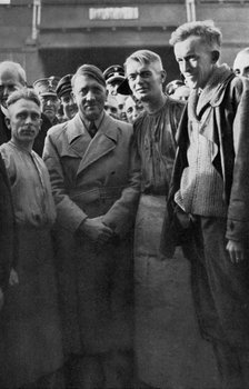 Adolf Hitler with the workers of Siemensstadt, Berlin, Germany, 1936. Artist: Unknown