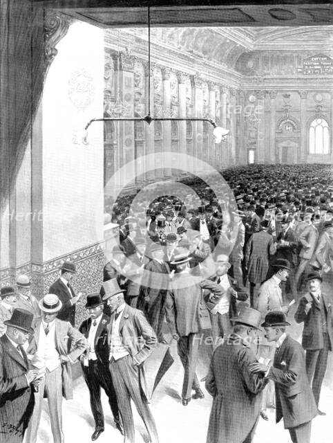 The most silent business men: in the Exchange at its busiest hour, 1909. Creator: Samuel Begg.