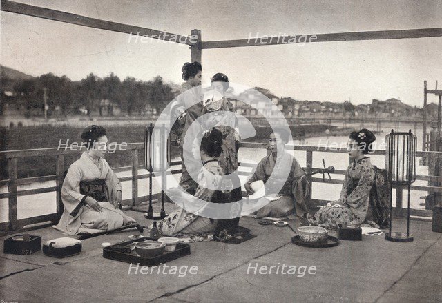 'A Japanese Meal', c1903. Artist: David Stevenson & Co.