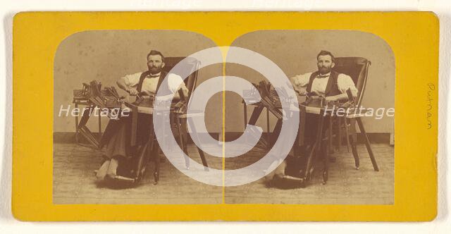 Portrait of Charles H. Barnes, Hardwick, Mass. seated in handicapped-style chair making ..., 1870s. Creator: George T Putnam.