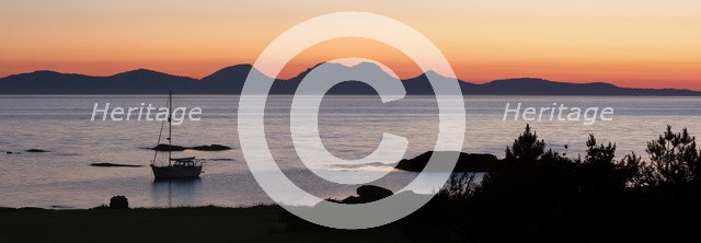 Sunset over Jura seen from Kintyre, Argyll and Bute, Scotland.