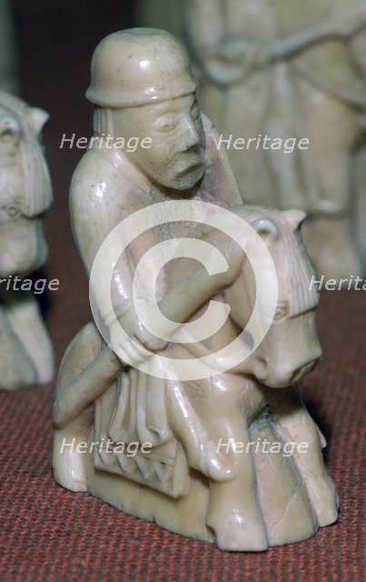 A Knight - The Lewis Chessmen, (Norwegian?), c1150-c1200. Artist: Unknown