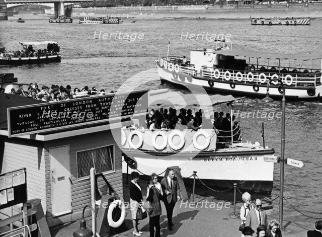 Tourists on a river cruise, Tower Pier, Tower Hamlets, London, c1960s. Artist: Unknown