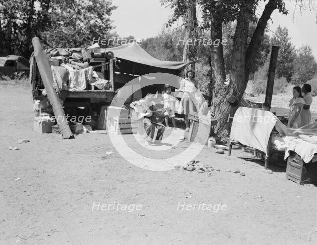 Camp of migratory families in "Ramblers Park", Yakima Valley, Washington, 1939. Creator: Dorothea Lange.