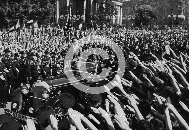 Adolf Hitler departing after making a speech, Berlin, Germany, 1 May 1934. Artist: Unknown