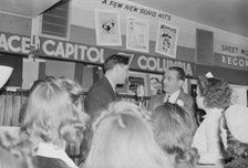 Portrait of Tommy Dorsey and William P. Gottlieb, record store, Washington, D.C., ca. 1940. Creator: Delia Potofsky Gottlieb.