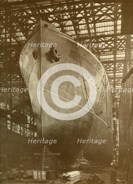 'The Cunard "Aurania" (14,000 Tons) on the Stocks at Newcastle-On-Tyne', c1930. Creator: Unknown.