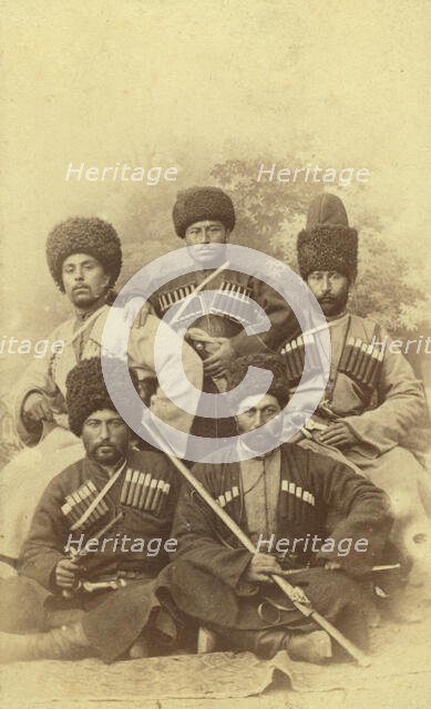 Group portrait of five men, seated, facing front, between 1870 and 1886. Creator: Unknown.
