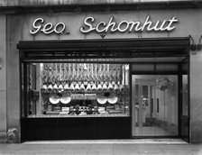 Window of George Schonhut's butcher's shop, Barnsley, South Yorkshire, 1955. Artist: Michael Walters