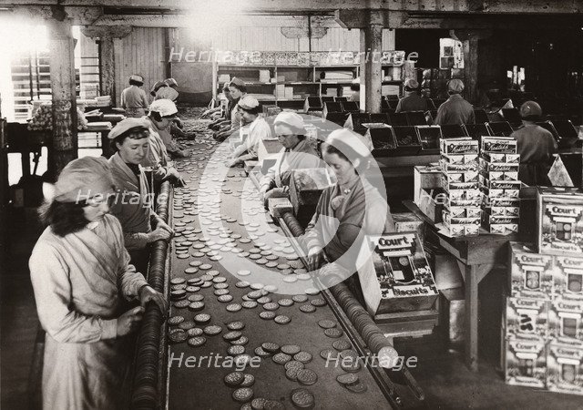Women packing Court Biscuits,  Norwich, Caley factory, Norfolk, 1937. Artist: Unknown