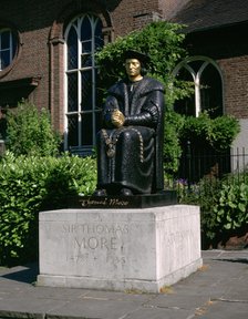 Statue of Sir Thomas More in front of Chelsea Old Church, Cheyne Walk, London.