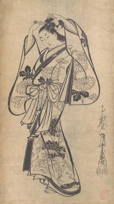 Courtesan Placing a Hairpin in Her Hair, ca. 1714., ca. 1714. Creator: Kaigetsudô Anchi.