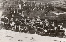 Rowntree boys on an outing sit on a rocky outcrop ,Filey Brig, Yorkshire, June 1911. Artist: Unknown
