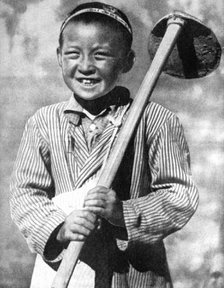 Uzbek schoolboy working on a farm, 1936. Artist: Unknown
