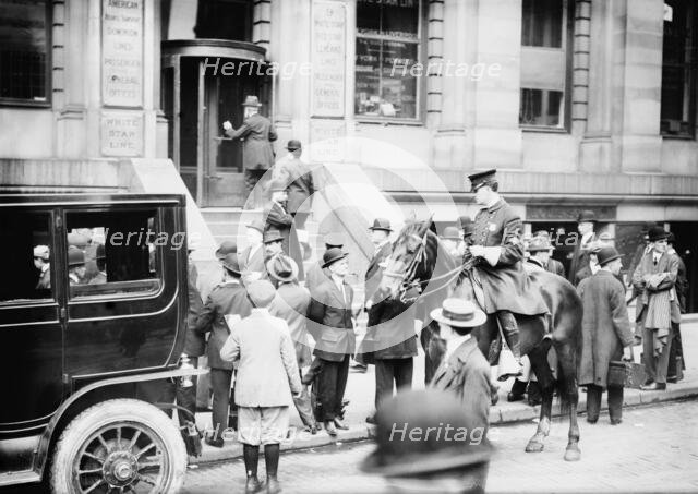 Getting Titanic news - White Star Office, 1912. Creator: Bain News Service.