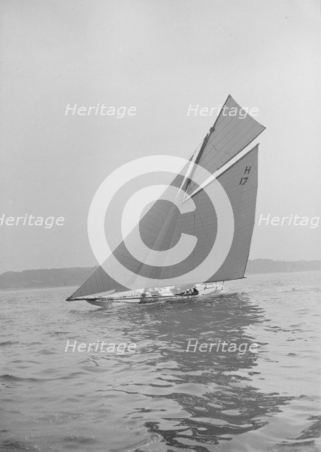 The 8 Metre 'Ierne' sailing close-hauled, 1913. Creator: Kirk & Sons of Cowes.