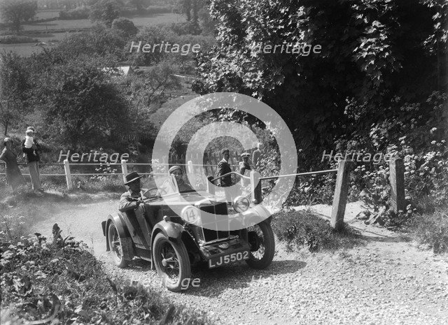 1932 MG M type taking part in a West Hants Light Car Club Trial, Ibberton Hill, Dorset, 1930s. Artist: Bill Brunell.