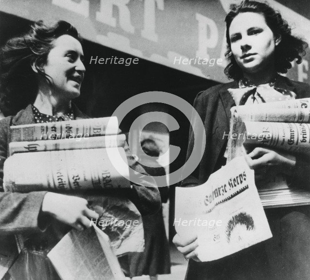 Women selling German newspapers, German-occupied Paris, 19 July 1940. Artist: Unknown