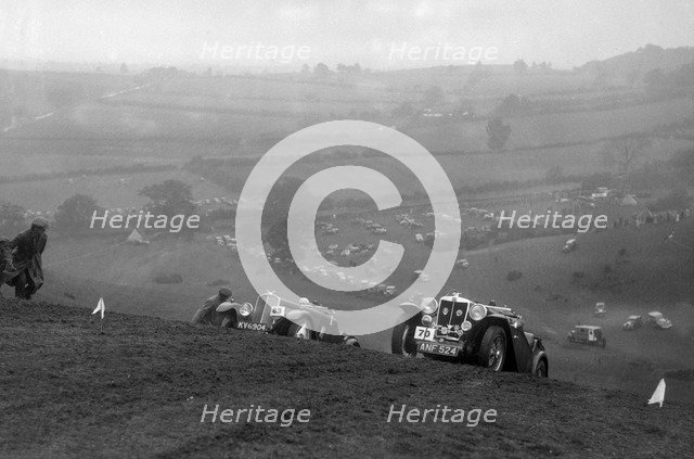 Triumph Southern Cross and MG Magnette at the MG Car Club Rushmere Hillclimb, Shropshire, 1935. Artist: Bill Brunell.