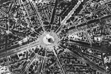 A bird's eye view of the Place de L'Etoile and the Arc de Triomphe, Paris, 1931. Artist: Ernest Flammarion