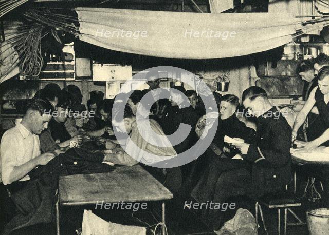 Royal Marines on their mess deck on board a ship, World War II, c1939-c1943 (1944). Creator: Unknown.