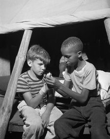 First aid at Camp Nathan Hale, Southfields, New York, 1943 Creator: Gordon Parks.