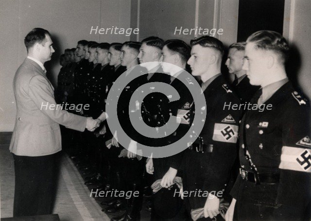 Nazi Deputy Führer Rudolf Hess meeting members of the Hitler Youth, Germany, January 1939. Artist: Unknown
