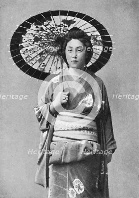 A Japanese lady in walking costume, 1902. Artist: Unknown.