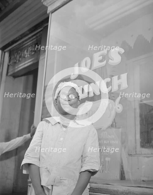 Shopper on Saturday afternoon, Washington, D.C., 1942. Creator: Gordon Parks.