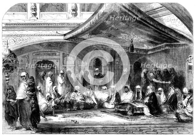 Interior of a Sikh Temple at Umritzir - reading the Grunt'h, 1858. Creator: Unknown.