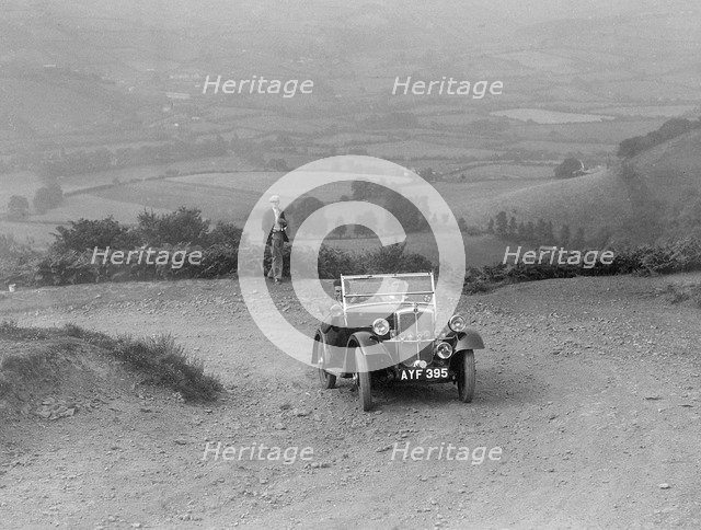 Morris Minor competing in the Barnstaple Trial, c1935. Artist: Bill Brunell.