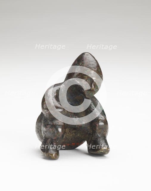 Ornament in the form of a seated person, Possibly Han dynasty, 206 BCE-220 CE. Creator: Unknown.