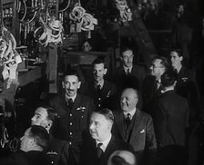 RAF Pilots Touring a Plane Factory, 1942. Creator: British Pathe Ltd.