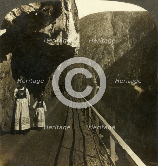 'Narrow rock-shelf where the road to Voring Falls past Lake Oifjord's deep waters, Norway', c1905. Creator: Unknown.