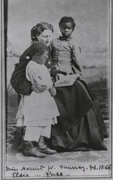 Portrait of Sea Island School teacher Miss Harriet W. Murray, with students Elsie and Puss, 1866-02. Creator: Unknown.