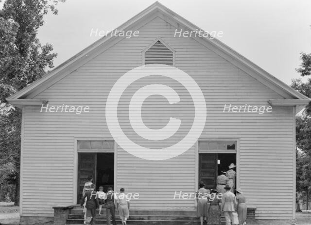 Congregation entering church, Wheeley's Church, Person County, North Carolina, 1939. Creator: Dorothea Lange.