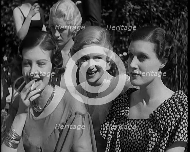 A Large Group of Female Civilians Posing for Photos, 1931. Creator: British Pathe Ltd.