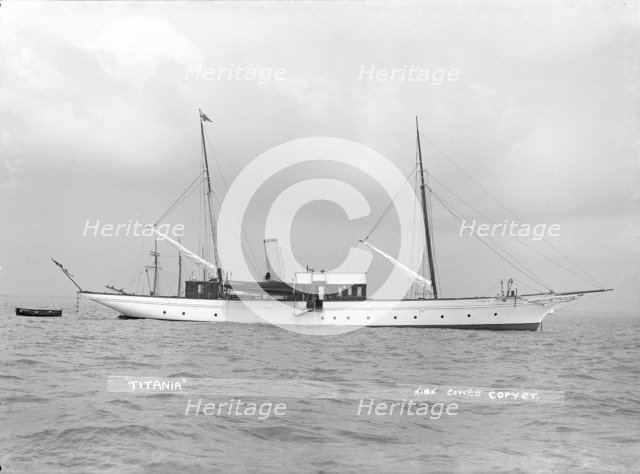 The steam yacht 'Titania' at anchor, 1914. Creator: Kirk & Sons of Cowes.